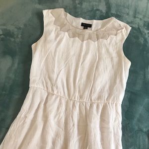 White dress with detailed neckline